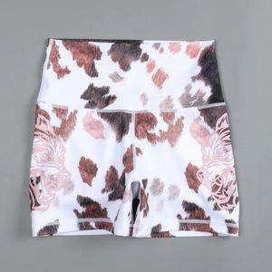 SHE Darc Sport dual wolf shorts in canton cow print